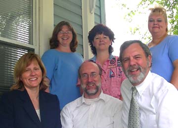 Tate & Renner staff. Standing: Sally, Kandy & Jeri. Sitting: Sonia, Richard & Tony.